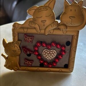 Gold Cat-Themed Picture Frame with Red Accents